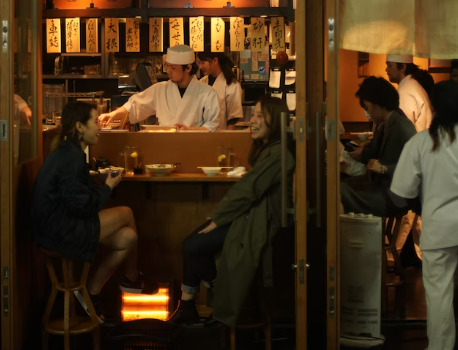 Meeting people at the counter of izakaya